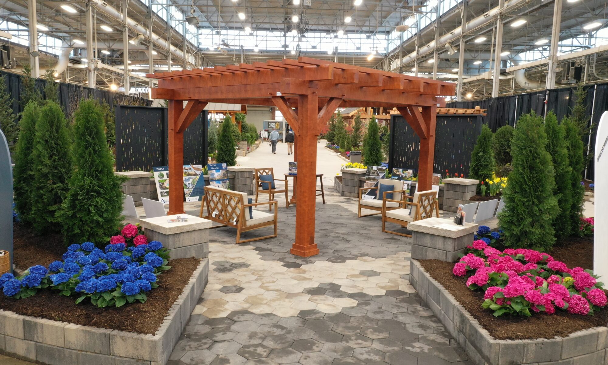 Precision Outdoors Flower and patio show 2023 indianapolis exterior build backyard goals dream backyard the smart pergola belgard plants shrubs tree water features bridge rock pavers paver fire pit lawn games connect four giant jingo astroturf astro turf traditional pergola modern pergola honeycomb tile checkers corn hole precision stone walkway inground in ground trampoline wooden playhouse woodman playhouses custom outdoor pitching dining cedar fountain beautiful display boulders boulder private privacy screen screens cozy entertainment entertaining precision design services