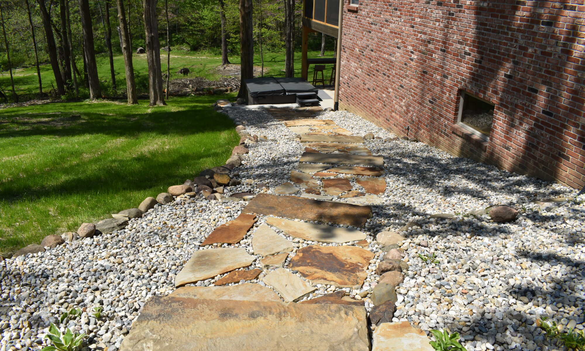 precision outdoors Bargersville elevated Exterior backyard remodel Trex composite decking concrete patio hot tub backyard goals dream backyard screened in porch outdoor living space dining area indiana exterior design relaxing outdoors tongue and groove ceiling modern cable railing custom rock landscaping walkway