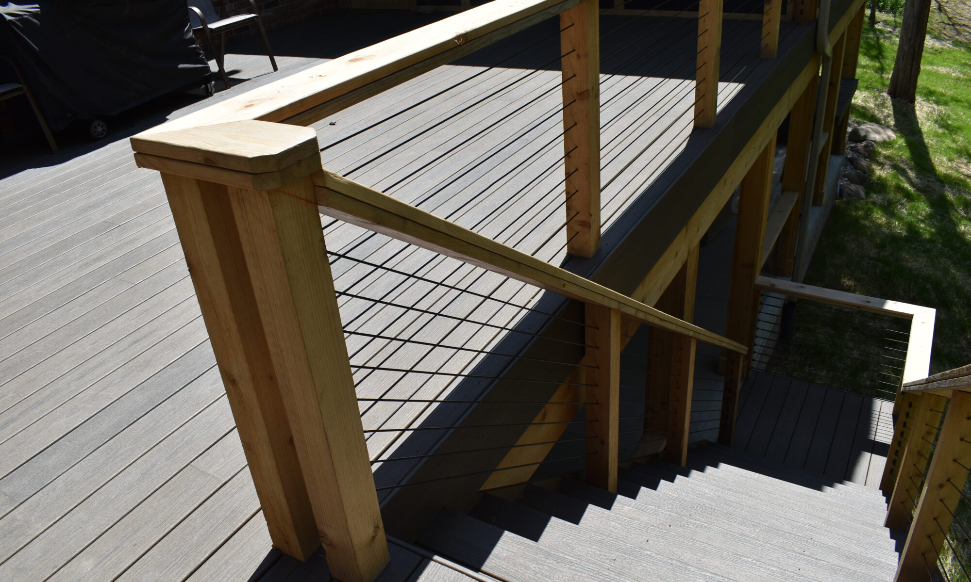 precision outdoors Bargersville elevated Exterior backyard remodel Trex composite decking concrete patio hot tub backyard goals dream backyard screened in porch outdoor living space dining area indiana exterior design relaxing outdoors tongue and groove ceiling modern cable railing custom rock landscaping walkway