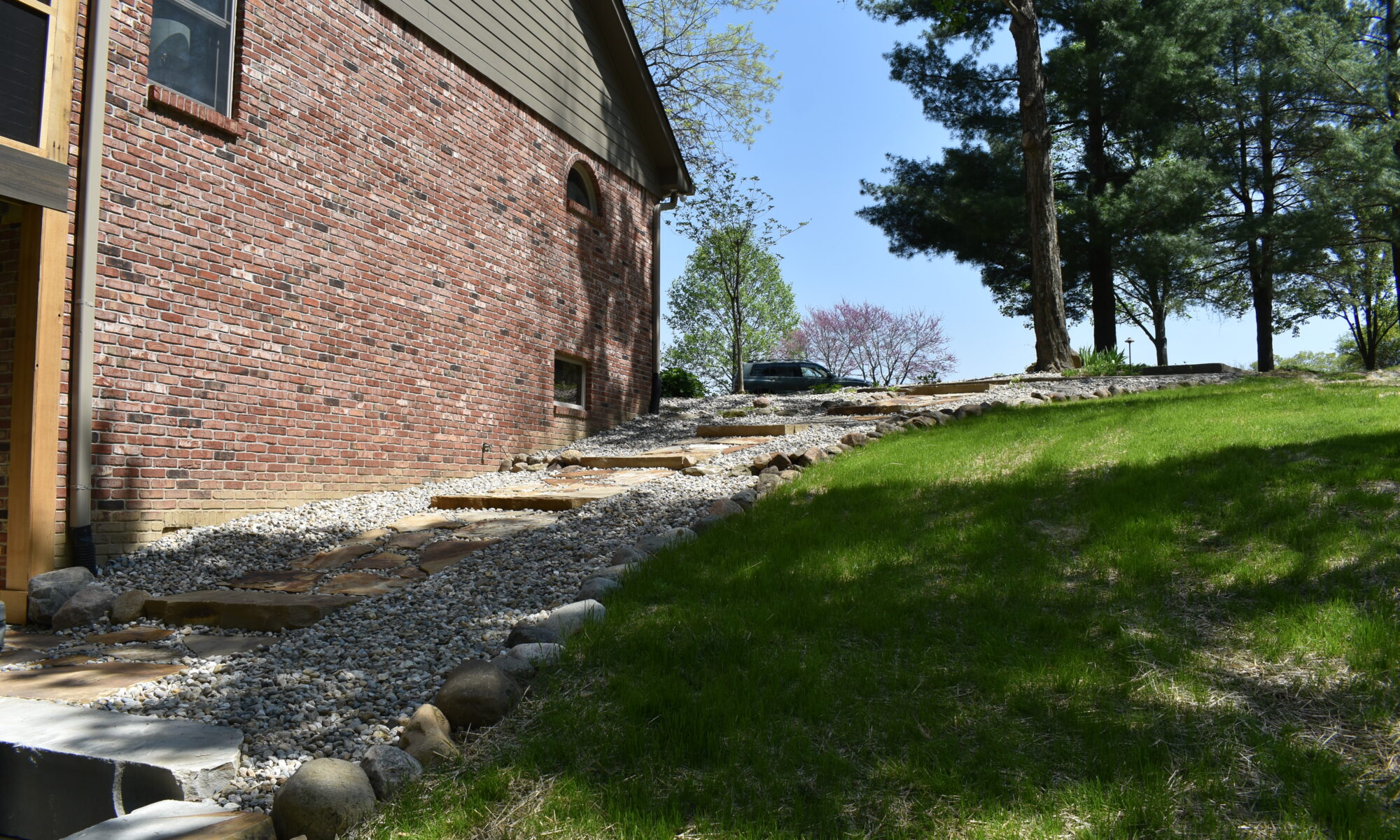 precision outdoors Bargersville elevated Exterior backyard remodel Trex composite decking concrete patio hot tub backyard goals dream backyard screened in porch outdoor living space dining area indiana exterior design relaxing outdoors tongue and groove ceiling modern cable railing custom rock landscaping walkway