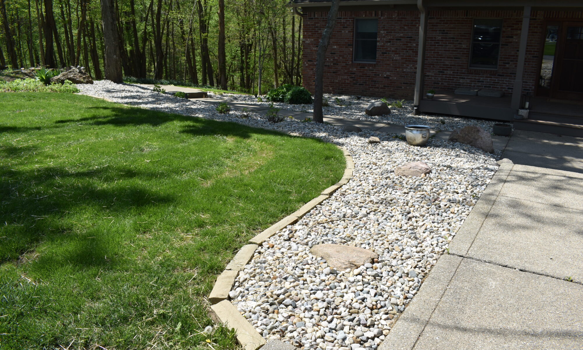 precision outdoors Bargersville elevated Exterior backyard remodel Trex composite decking concrete patio hot tub backyard goals dream backyard screened in porch outdoor living space dining area indiana exterior design relaxing outdoors tongue and groove ceiling modern cable railing custom rock landscaping walkway